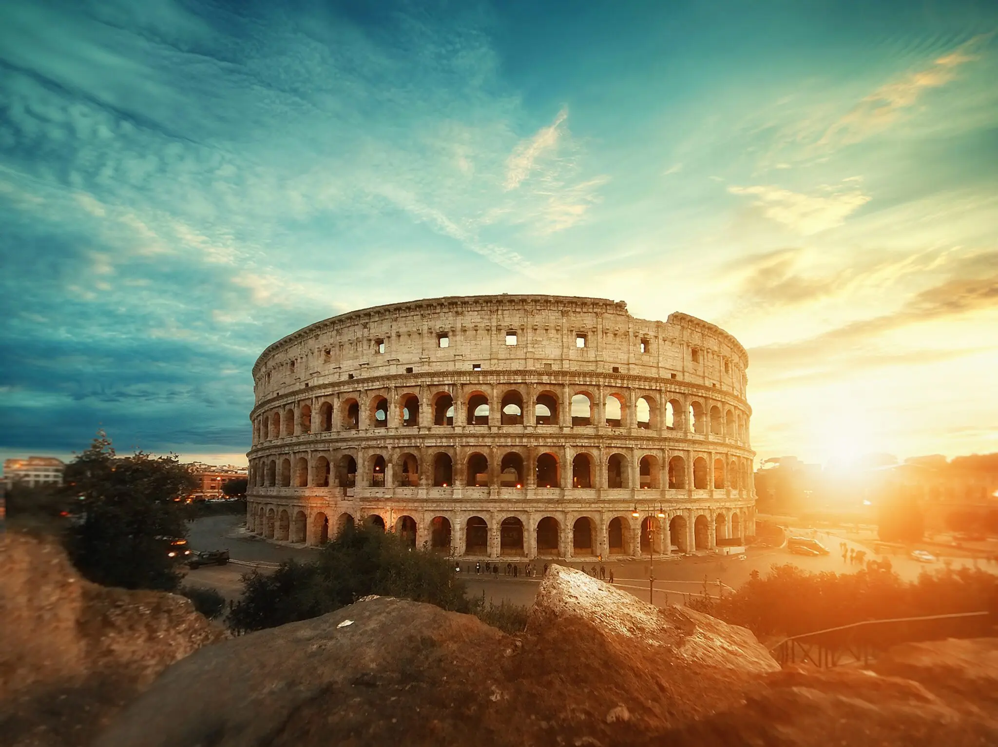 Beautiful shot of the famous Roman Colosseum amphitheater under the breathtaking sky at sunrise CVC