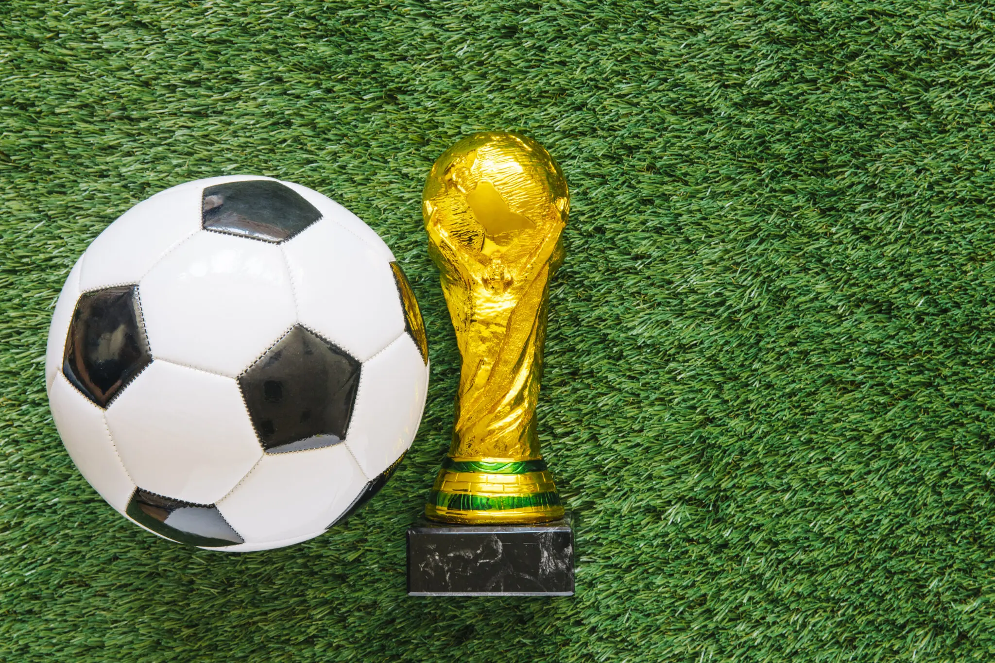 football-background-grass-with-ball-trophy