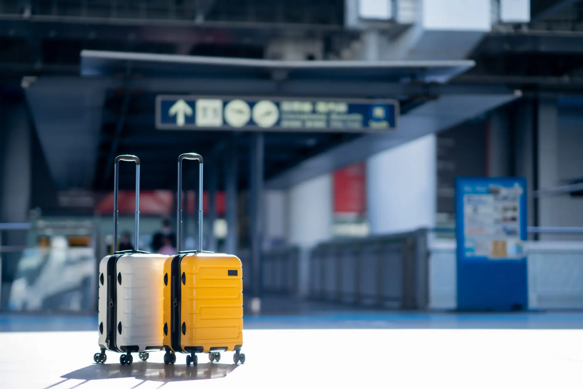 Travel,,Two,Suitcases,In,An,Empty,Airport,Hall,,Traveler,Cases