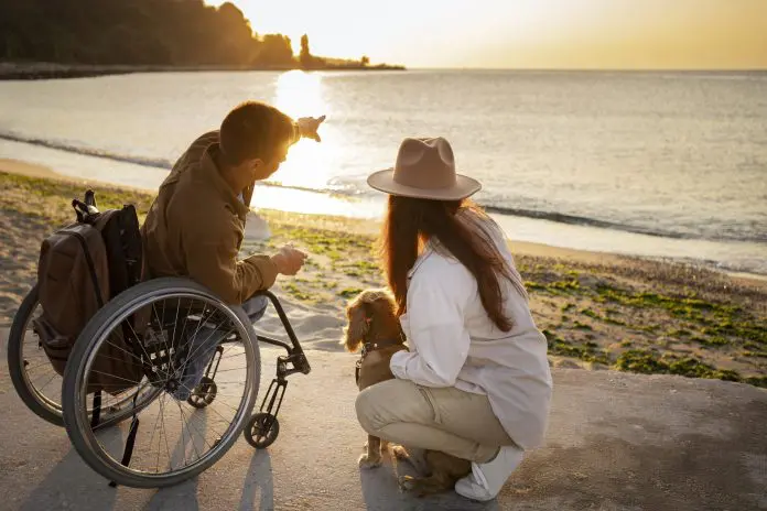 full-shot-couple-looking-sea