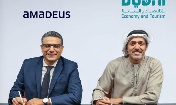 His-Excellency-Issam-Kazim-CEO-of-the-Dubai-Corporation-for-Tourism-and-Commerce-Marketing-DCTCM-part-of-DET-and-Maher-Koubaa-EVP-Travel-Unit-and-MD-EMEA-Amadeus-2-792x475