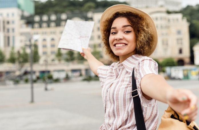 woman-traveling-alone-with-map