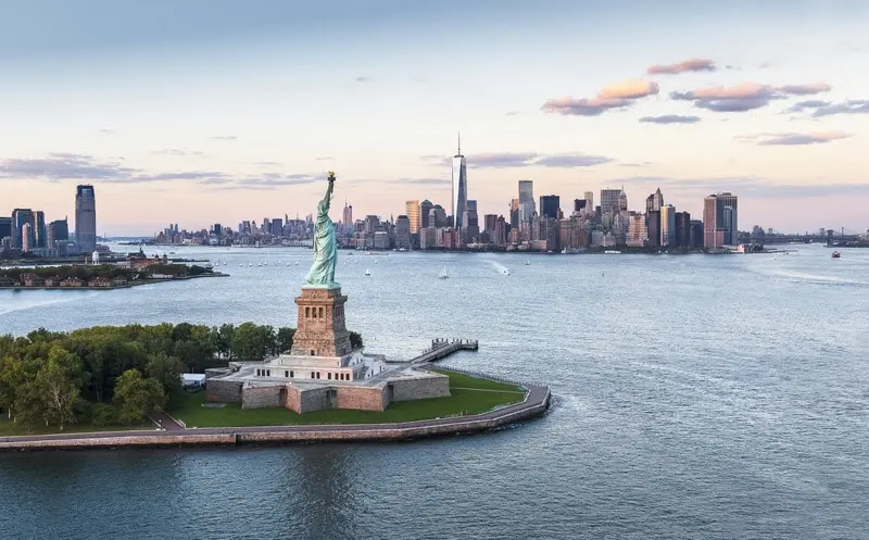 USA, New York City - The Statue of Liberty and Manhattan